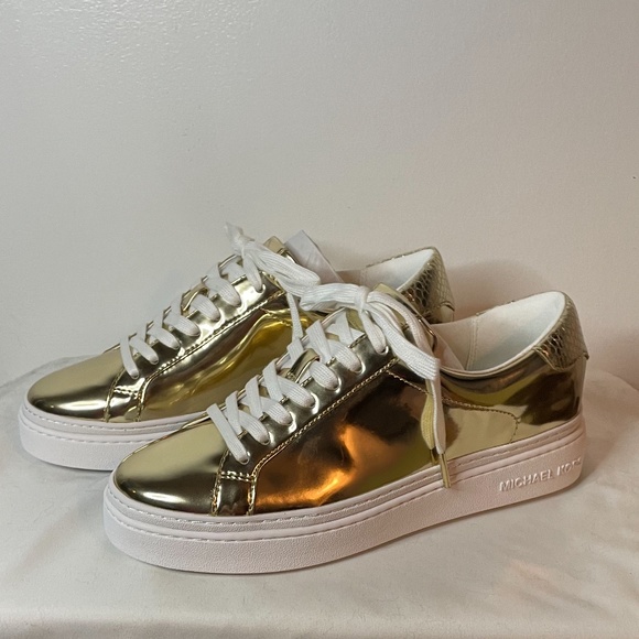MICHAEL Michael Kors Shoes - NWT Michael Kors pale metallic gold snakeskin heel lace up platform sneakers!